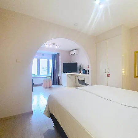 Gastenkamers Centersuites Affittacamere 3*